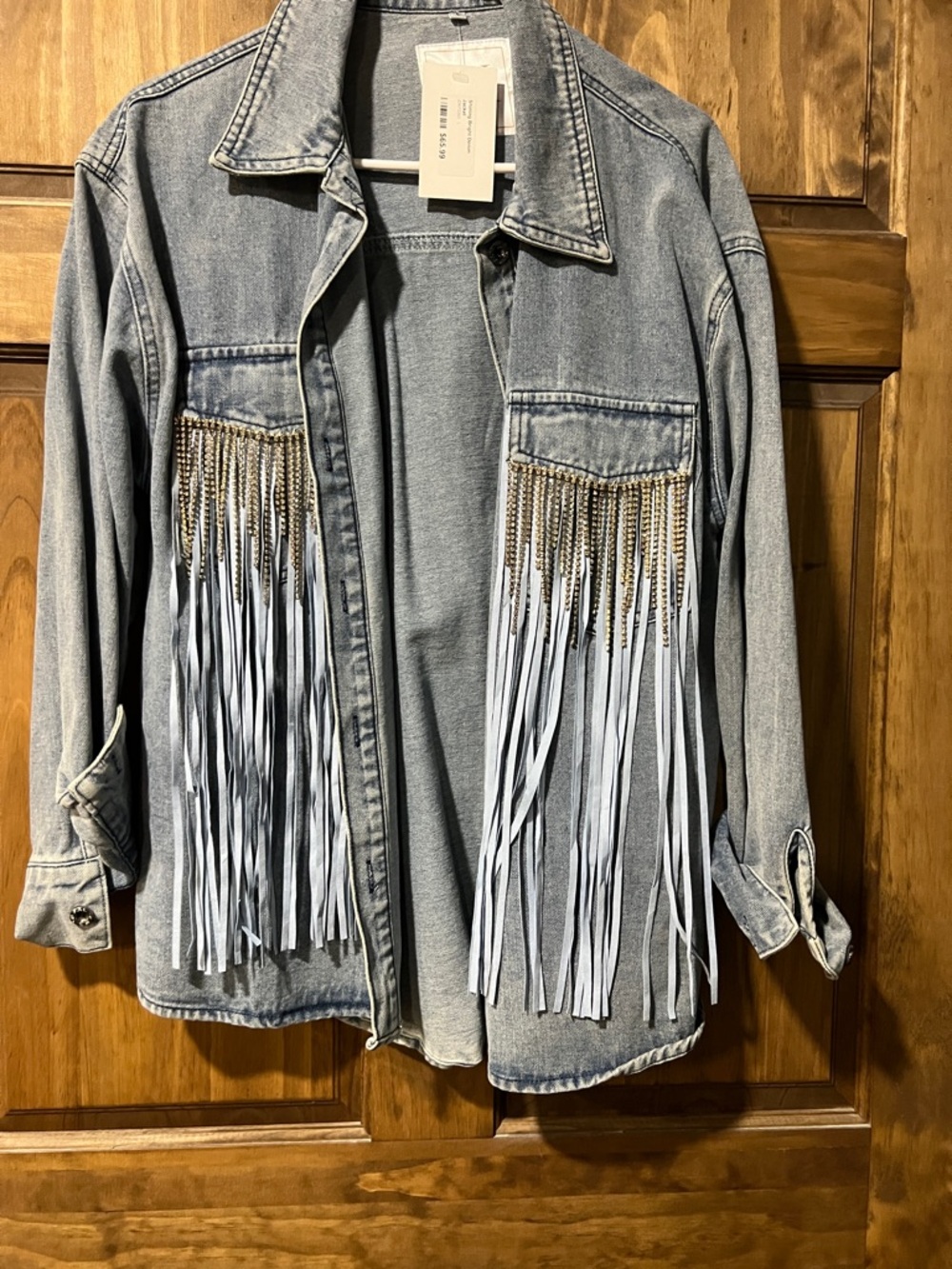 Fringed Light Wash Denim Jacket with Chain Detail